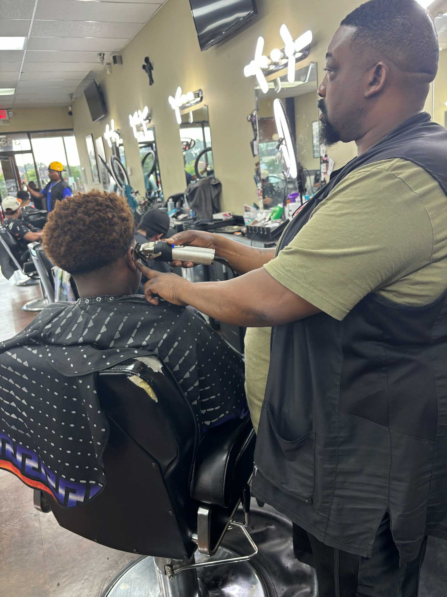 Judge the barber at Browns Barber Lounge donated haircuts for our young men.